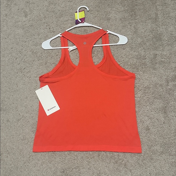 NWT Lululemon Swiftly Tech Racerback Tank Top 2.0 *Race Length
Pale Raspberry - Picture 8 of 8